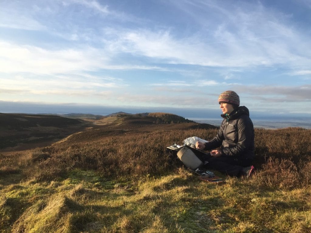 Libby Scott working Plein Air in the Scottish Hills