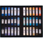 An open box of Michelle Lucking Beach 36 Set