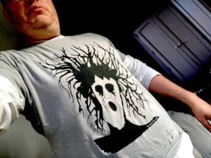 Nigel wearing one of the t-shirts he has designed