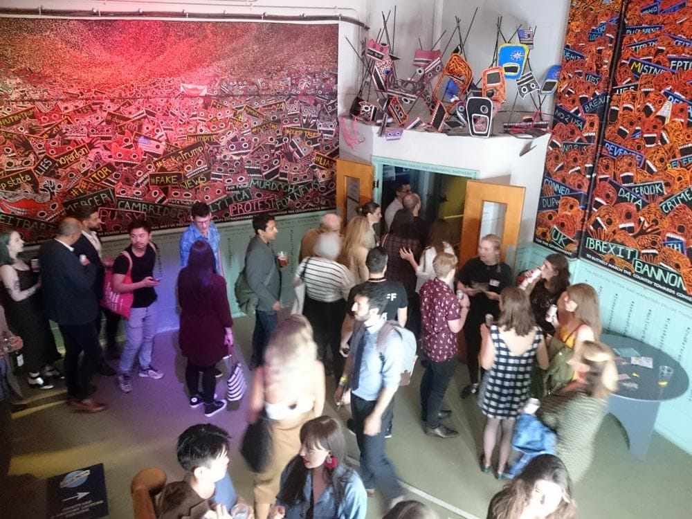 People fill the venue.