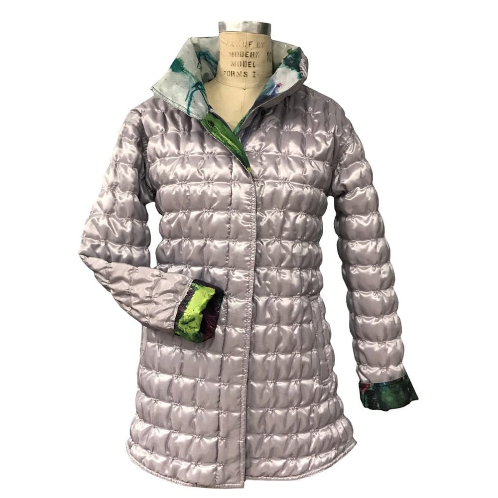 Ubuclothing raincoat in reverse mode, using fabric printed with Judy's Garden Epiphany painting which shows at the collar and cuff.