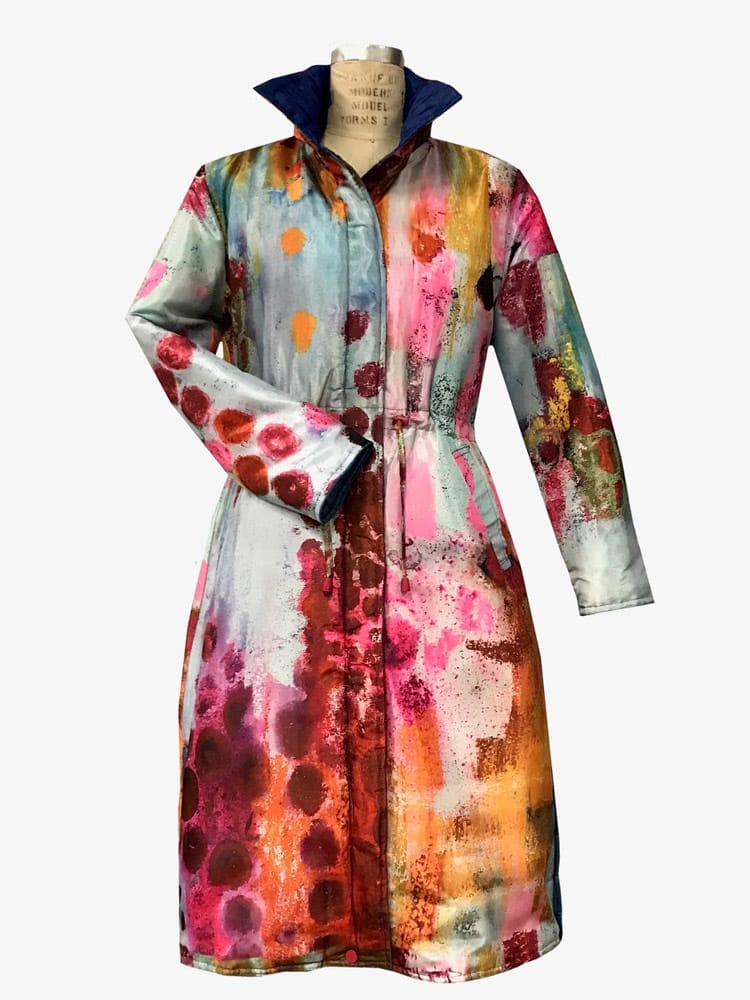 Ubuclothing raincoat using fabric printed with Judy's Solitaire painting.
