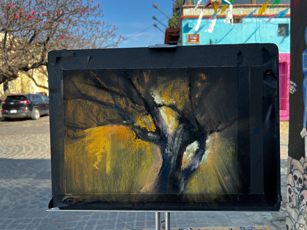 Painting of the dark tree trunk against golden background.