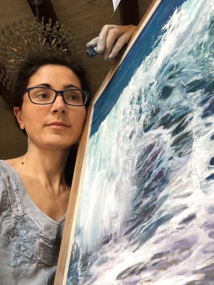 Elena with her wave painting.