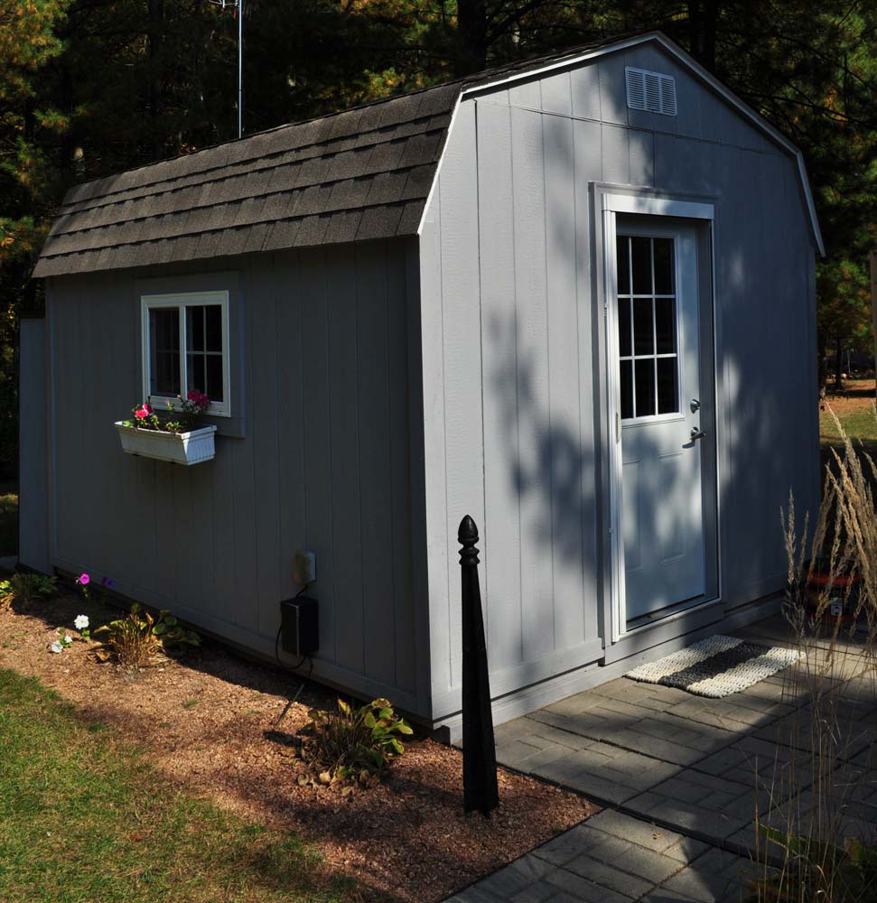 Susan's homely grey painted garden shed.