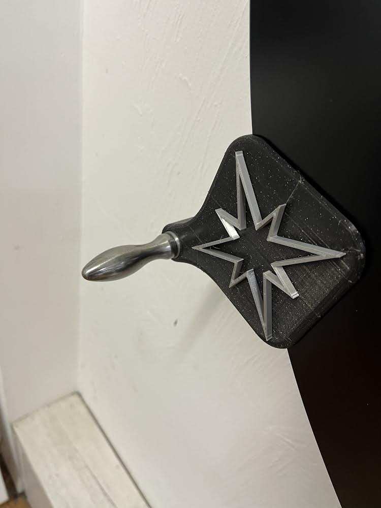 3D printed handle with which to rotate Stephen's artwork when on display.