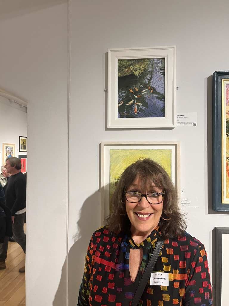 Lynn Howarth standing by her painting 'Koi at the Botanics'.