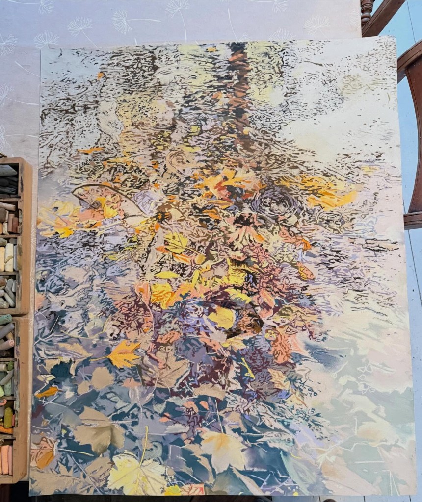 Pastel painting of Autumn leaves in a puddle.