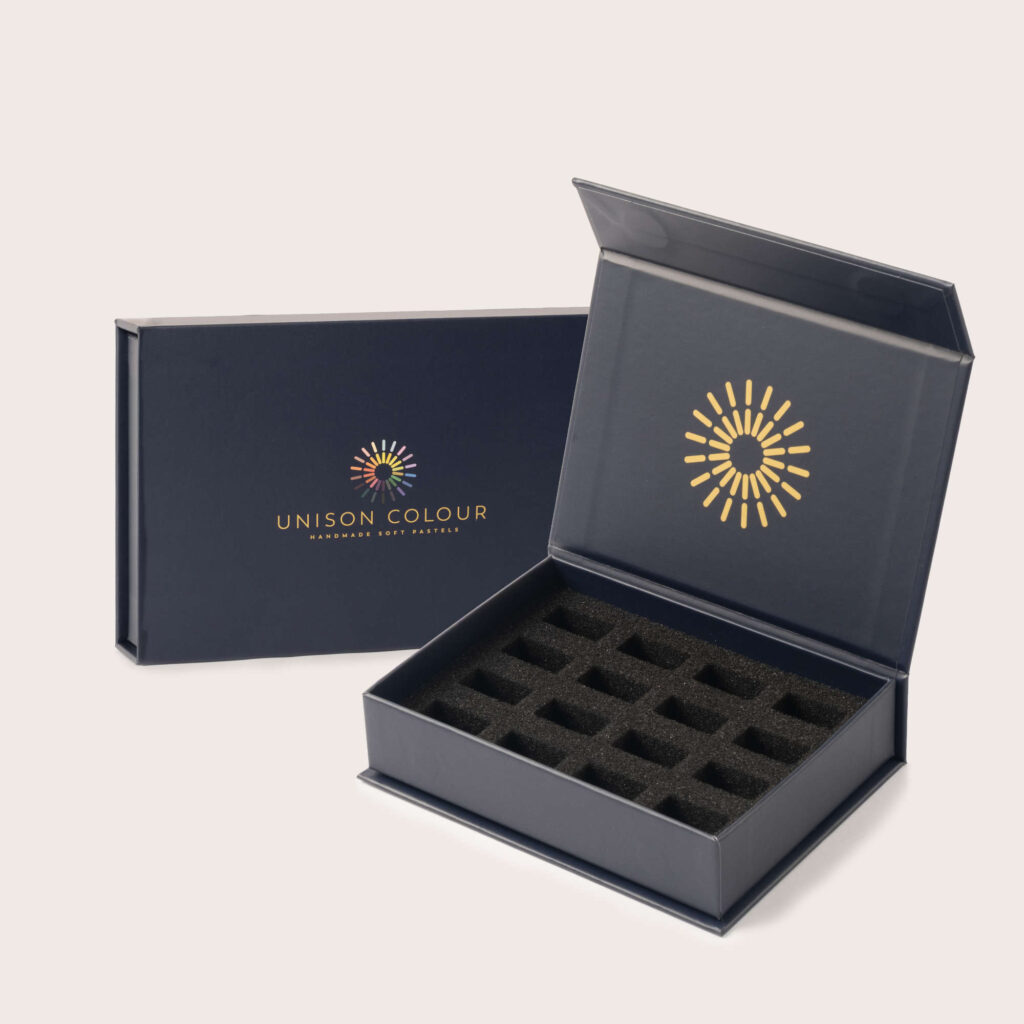 Opened empty soft pastel box for 16 half sticks.